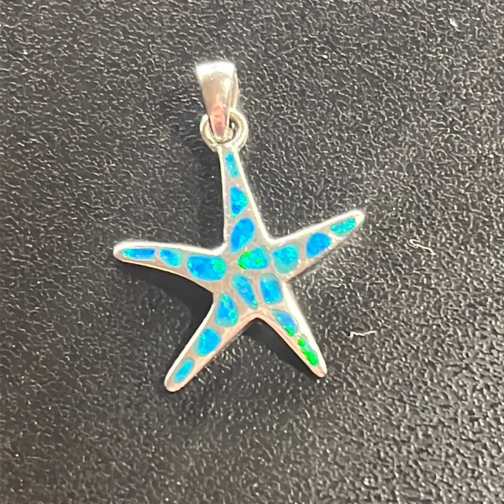 Silver starfish blue fire opal pendant